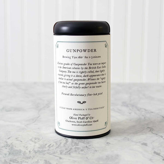 Gunpowder tea tin with brewing tips on marble surface, Come see us at Awaken, Franklin, Tennessee