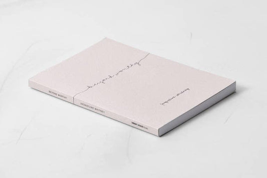 Soft pink book titled 'Beyond Worthy' by Jacqueline Whitney on white surface. Come see us at Awaken, Franklin, Tennessee
