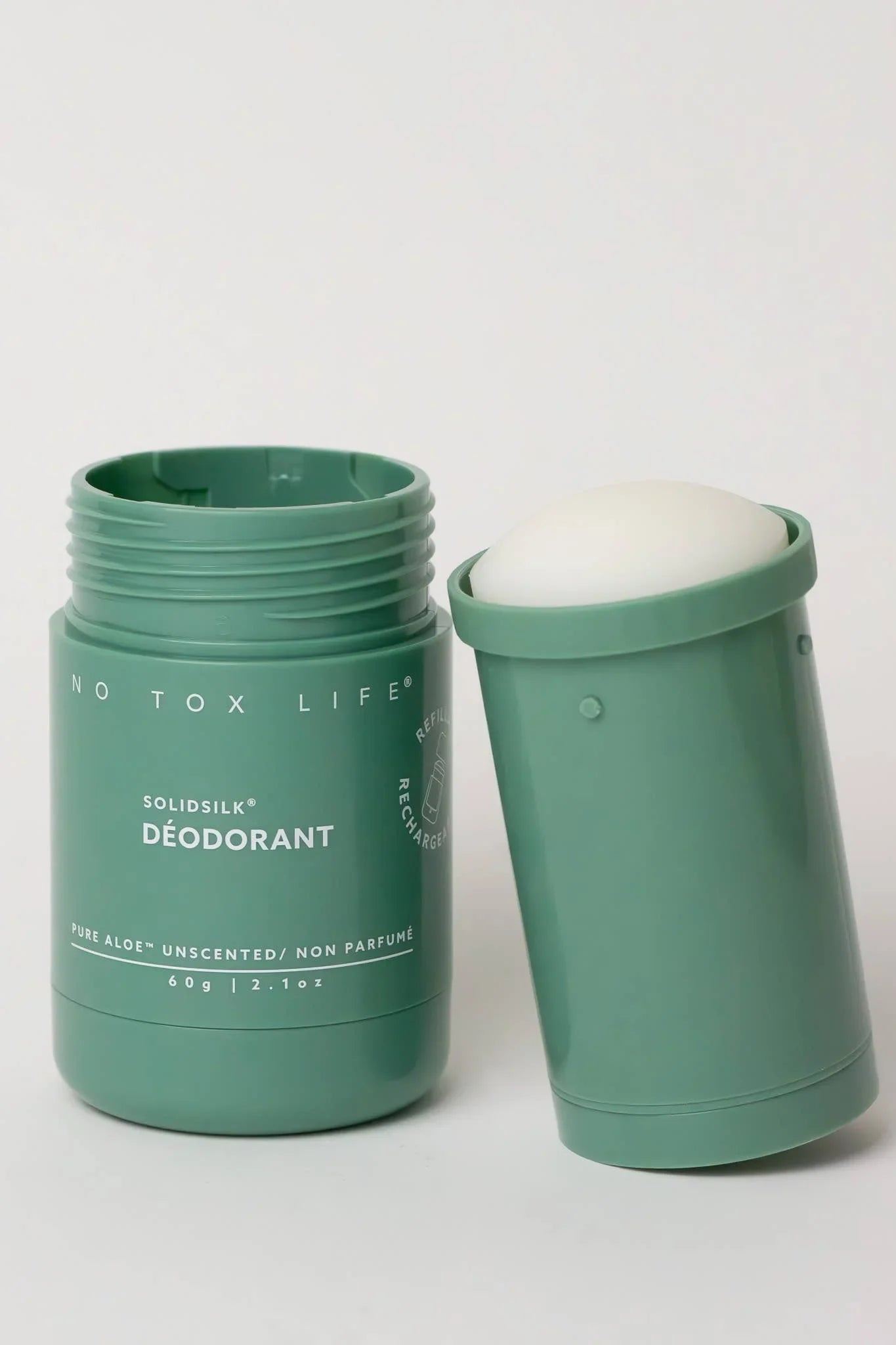 No Tox Life SolidSilk pure aloe unscented deodorant in green container, open with stick out. Come see us at Awaken, Franklin, Tennessee