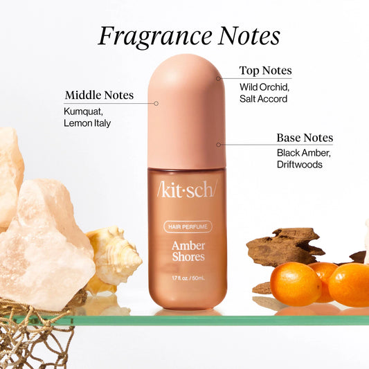 Kitsch Amber Shores hair perfume with fragrance notes and natural elements on glass shelf. Come see us at Awaken, Franklin, Tennessee
