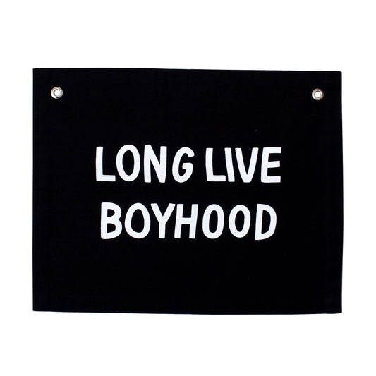 Black flag with white text Long Live Boyhood and metal grommets Come see us at Awaken, Franklin, Tennessee