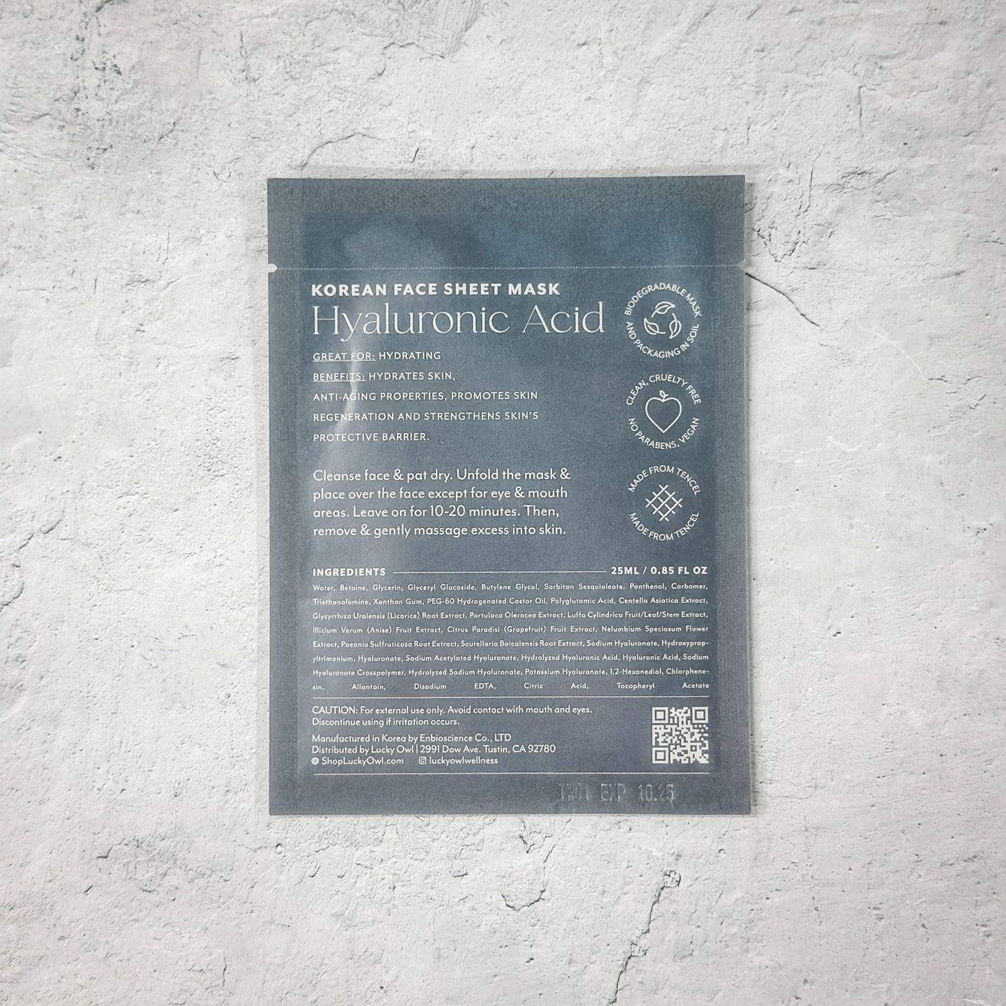 Korean Hyaluronic Acid face sheet mask package with skincare benefits and usage directions, on light textured surface. Come see us at Awaken, Franklin, Tennessee