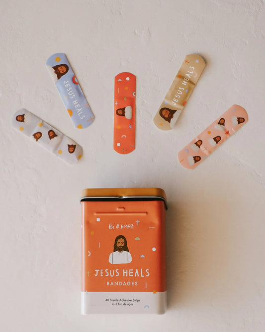 Jesus Heals bandages in five colorful designs with Christian artwork and box, Come see us at Awaken, Franklin, Tennessee