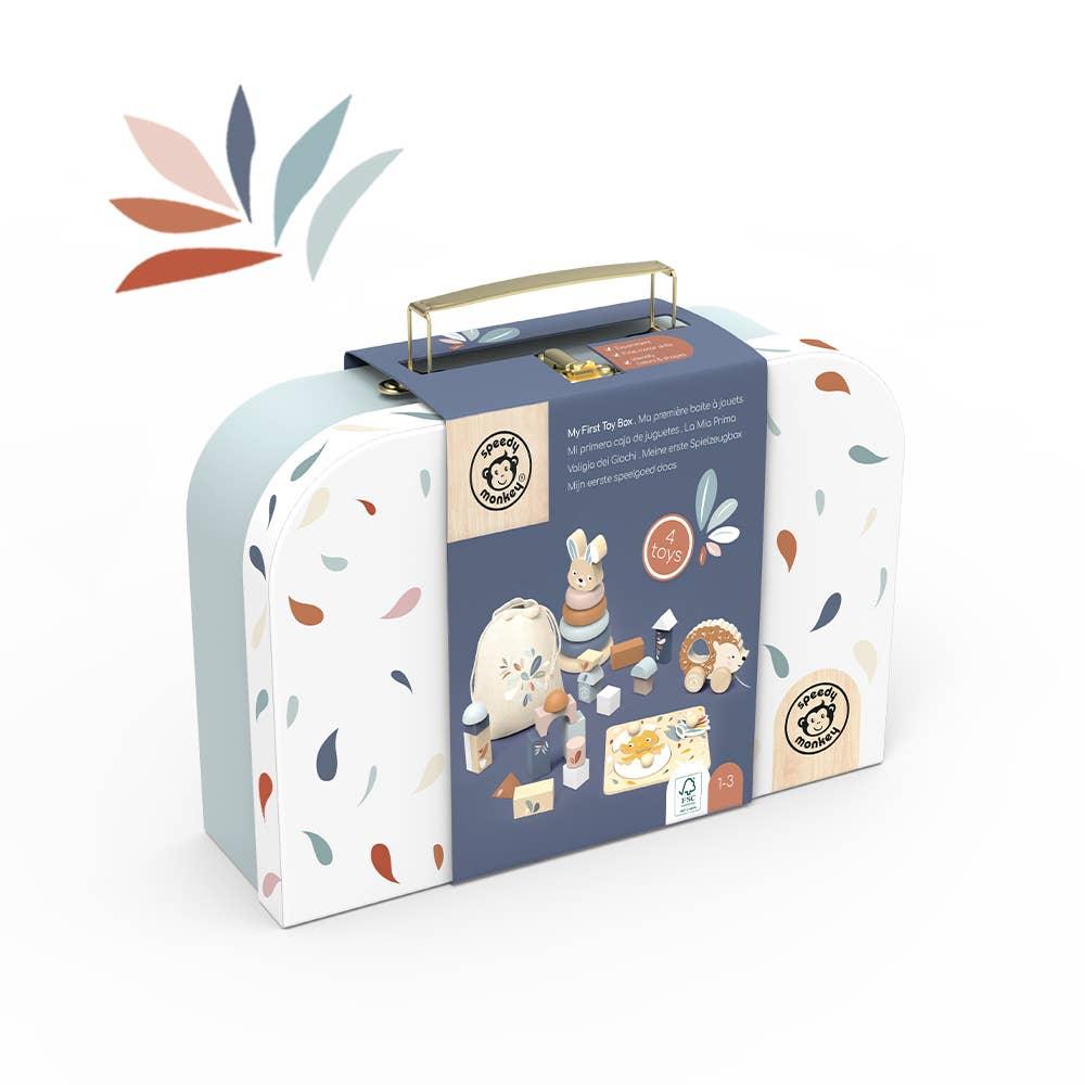 Speedy Monkey My First Toy Box with 4 wooden toys in patterned suitcase Come see us at Awaken, Franklin, Tennessee