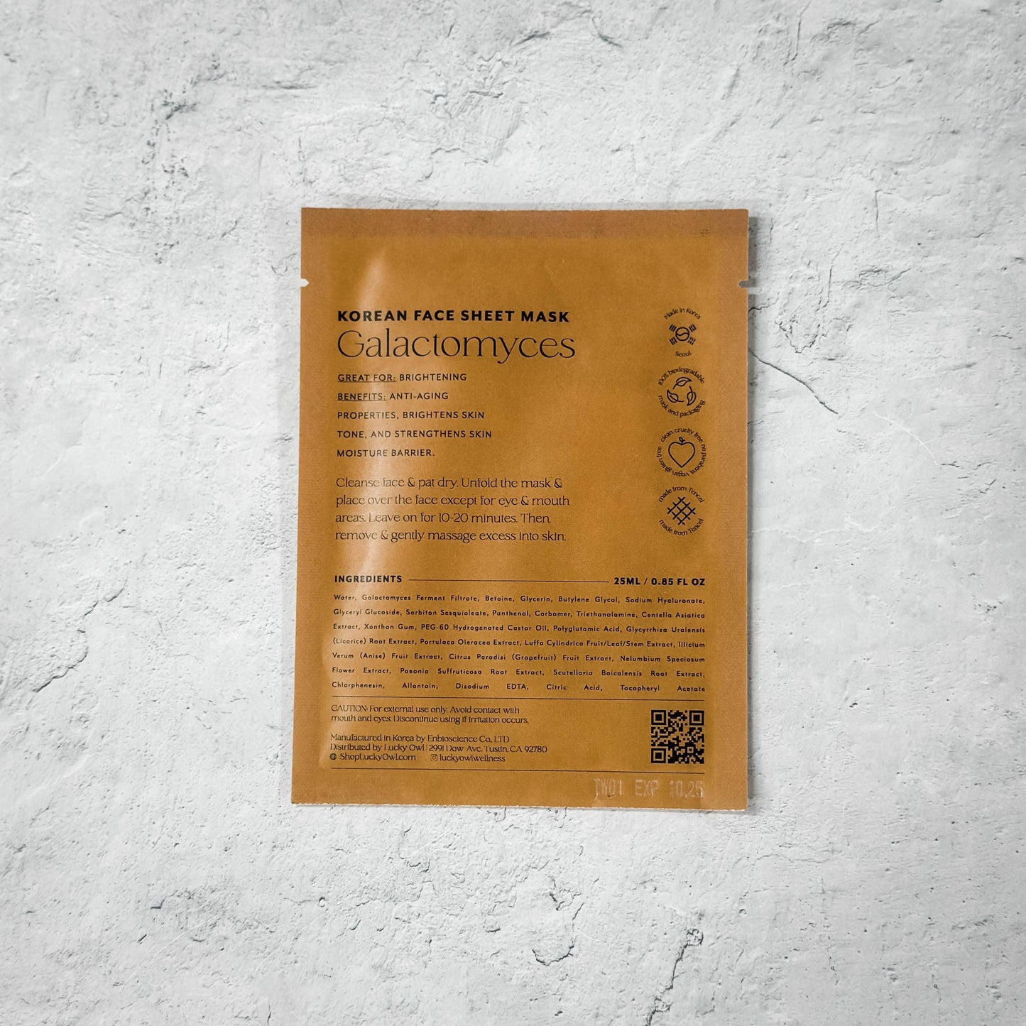 Korean Galactomyces face sheet mask packet on textured gray surface. Come see us at Awaken, Franklin, Tennessee