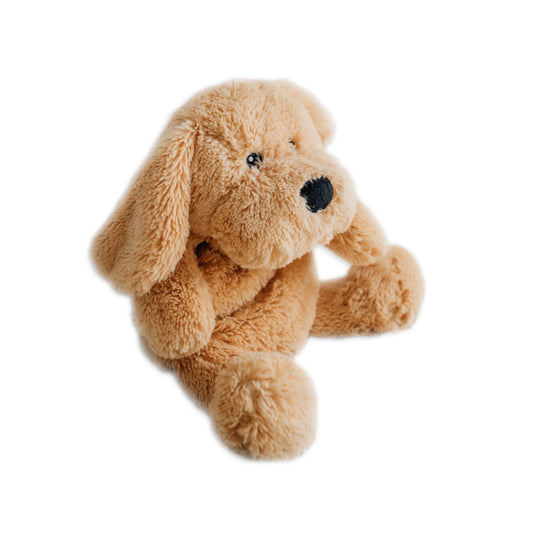 Soft light brown plush dog stuffed animal toy sitting on white background Come see us at Awaken, Franklin, Tennessee