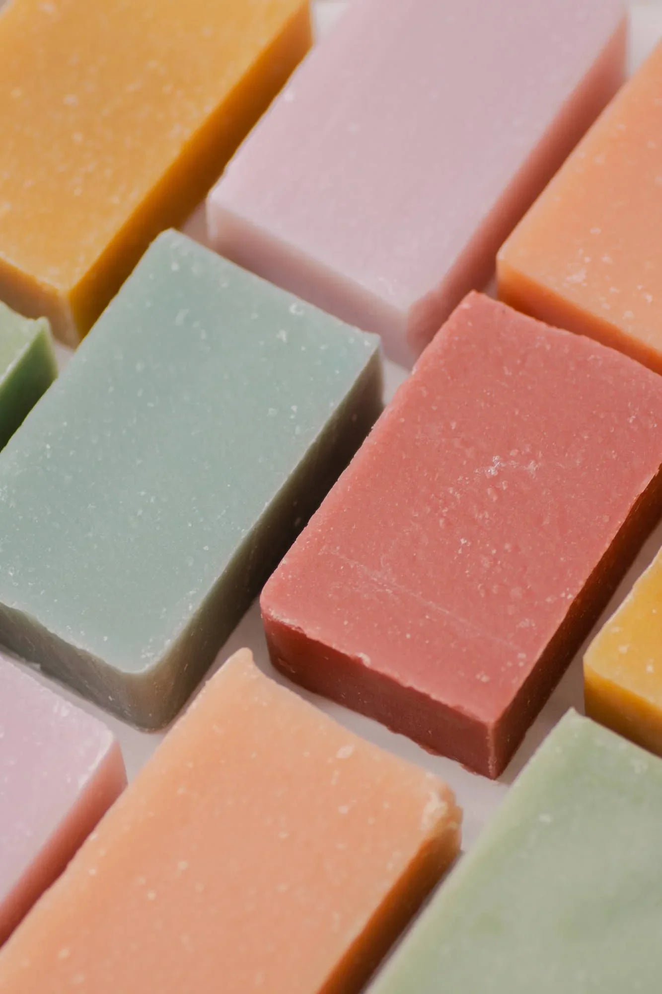 Close-up of colorful rectangular handmade soap bars in pastel shades, Come see us at Awaken, Franklin, Tennessee