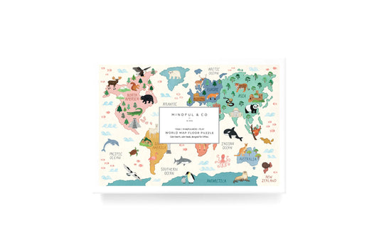 Mindful & Co kids world map floor puzzle with animals and landmarks, educational and playful. Come see us at Awaken, Franklin, Tennessee