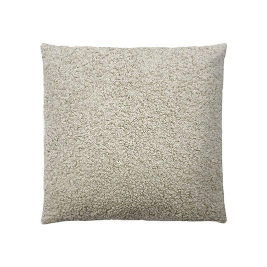 Soft textured beige square pillow with boucle fabric, cozy home decor. Come see us at Awaken, Franklin, Tennessee