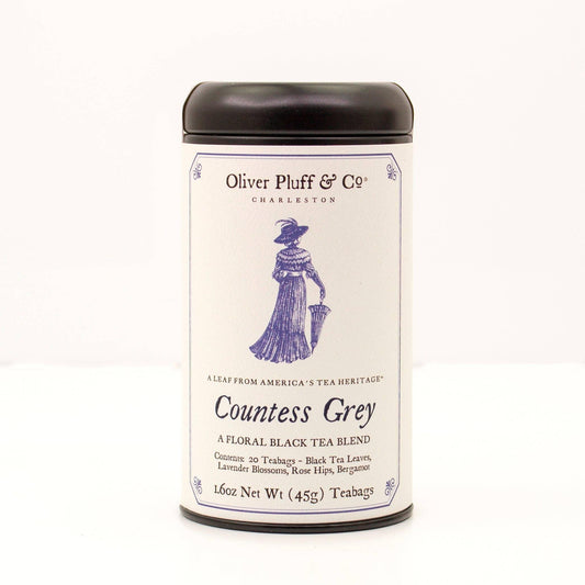 Oliver Pluff & Co Countess Grey floral black tea blend tin with vintage woman illustration. Come see us at Awaken, Franklin, Tennessee