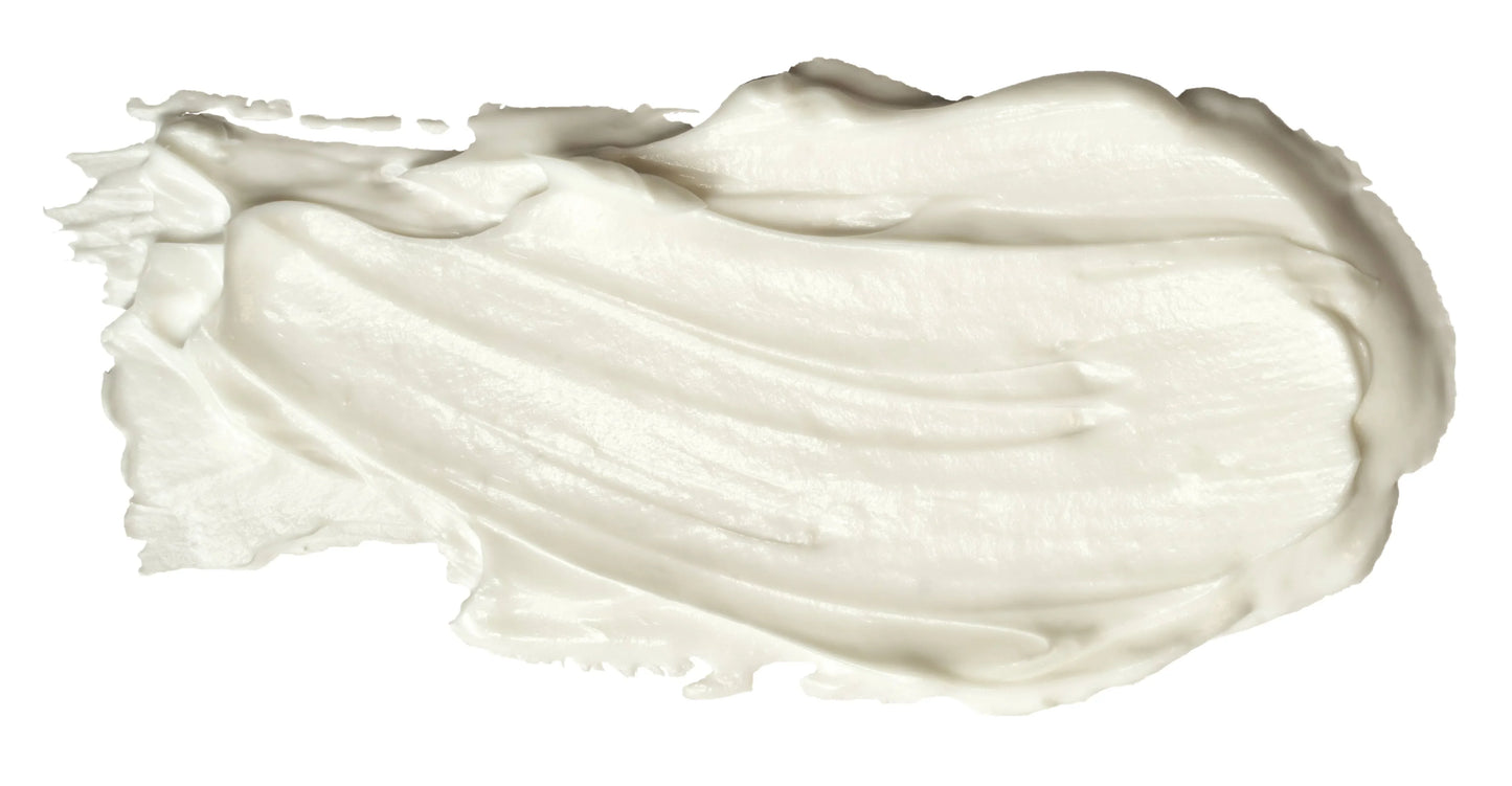 smoothing white skincare cream spread on white background, moisturizing lotion texture, Come see us at Awaken, Franklin, Tennessee