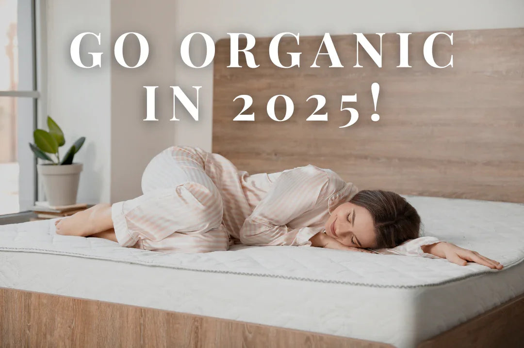 Woman in striped pajamas lying on organic mattress, Go Organic in 2025 text, Come see us at Awaken, Franklin, Tennessee
