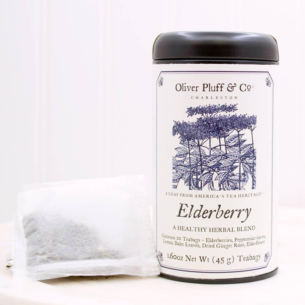 Oliver Pluff & Co Elderberry herbal tea tin and teabag on white background. Come see us at Awaken, Franklin, Tennessee