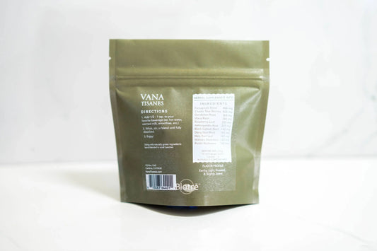 VANA TISANES herbal supplement pouch with ingredients and directions on white surface. Come see us at Awaken, Franklin, Tennessee