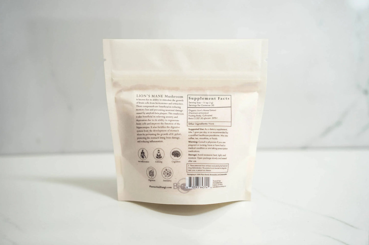 Back of Lion's Mane mushroom supplement bag with health benefits and supplement facts. Come see us at Awaken, Franklin, Tennessee