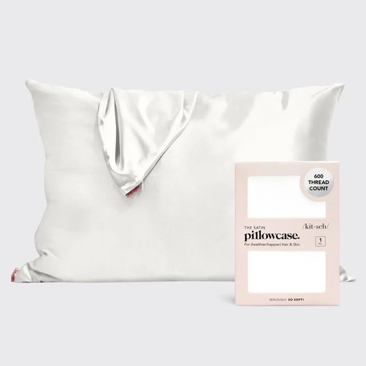 White satin pillowcase with packaging showing 600 thread count for hair and skin. Come see us at Awaken, Franklin, Tennessee