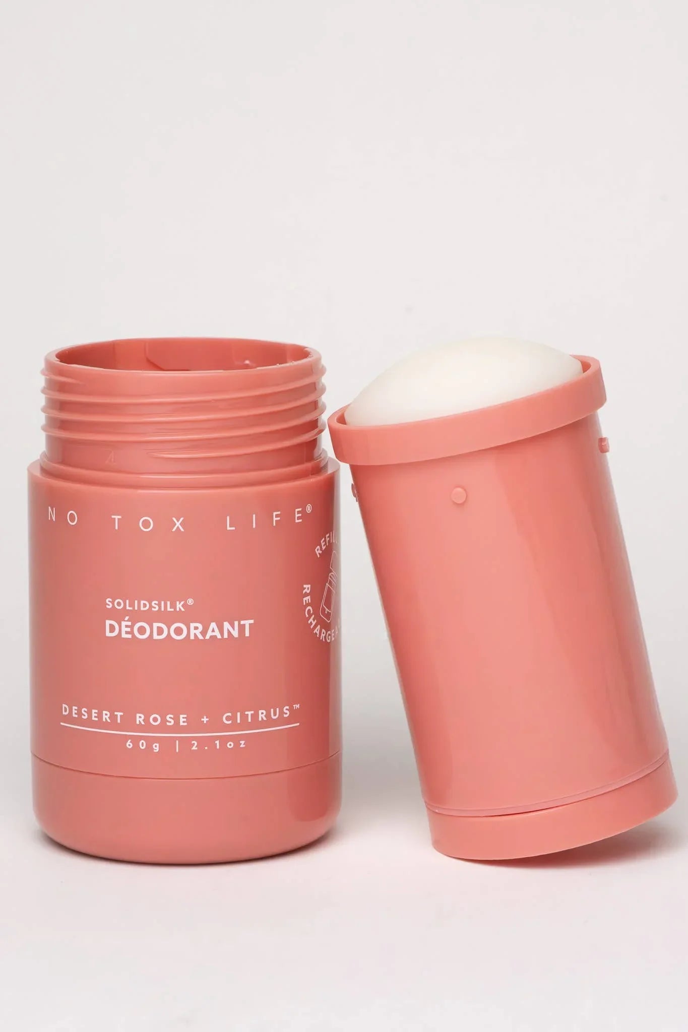 No Tox Life Solidsilk deodorant in Desert Rose + Citrus scent with open container on white background. Come see us at Awaken, Franklin, Tennessee