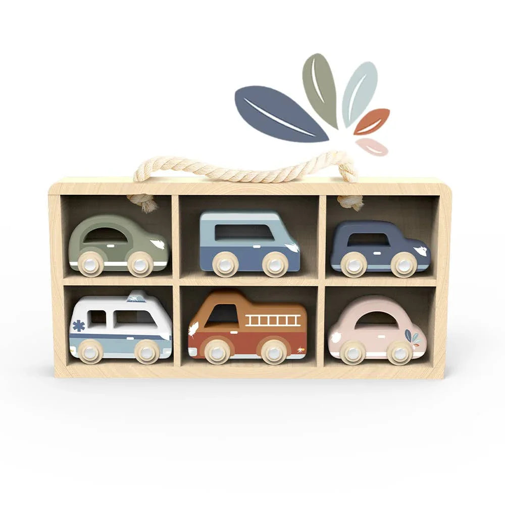 Wooden toy car set with six pastel vehicles in a wooden box with rope handle. Come see us at Awaken, Franklin, Tennessee