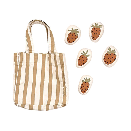 Striped canvas tote bag with five strawberry bean bags, Come see us at Awaken, Franklin, Tennessee.