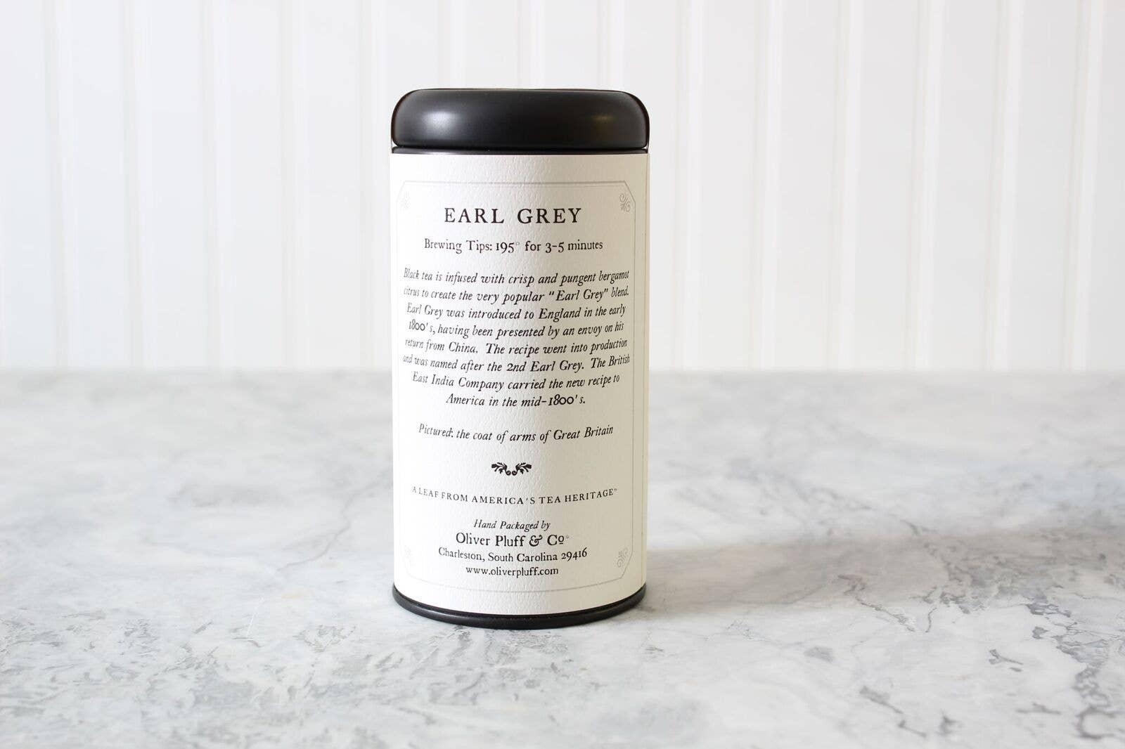 Oliver Pluff Earl Grey tea tin on marble surface with brewing tips and historic info, Come see us at Awaken, Franklin, Tennessee