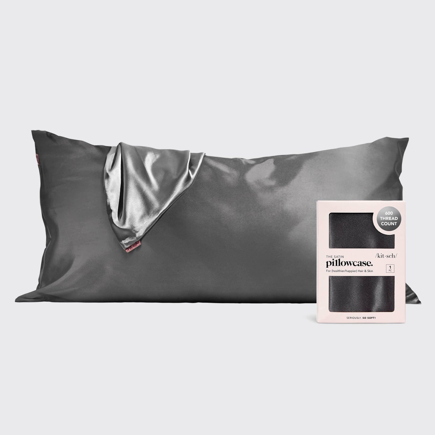 Gray satin pillowcase with packaging highlighting 600 thread count for healthier hair and skin. Come see us at Awaken, Franklin, Tennessee