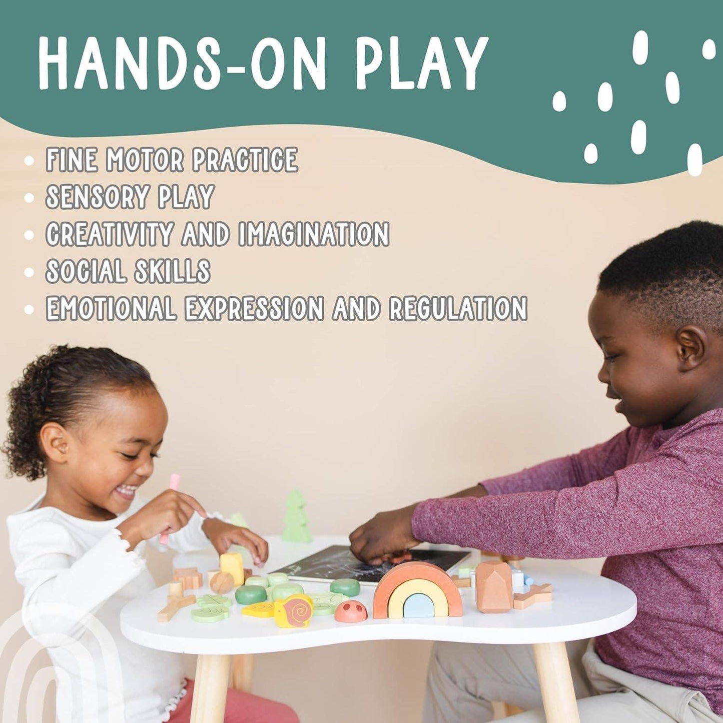 Two children playing with wooden toys on a white table, promoting hands-on play benefits. Come see us at Awaken, Franklin, Tennessee