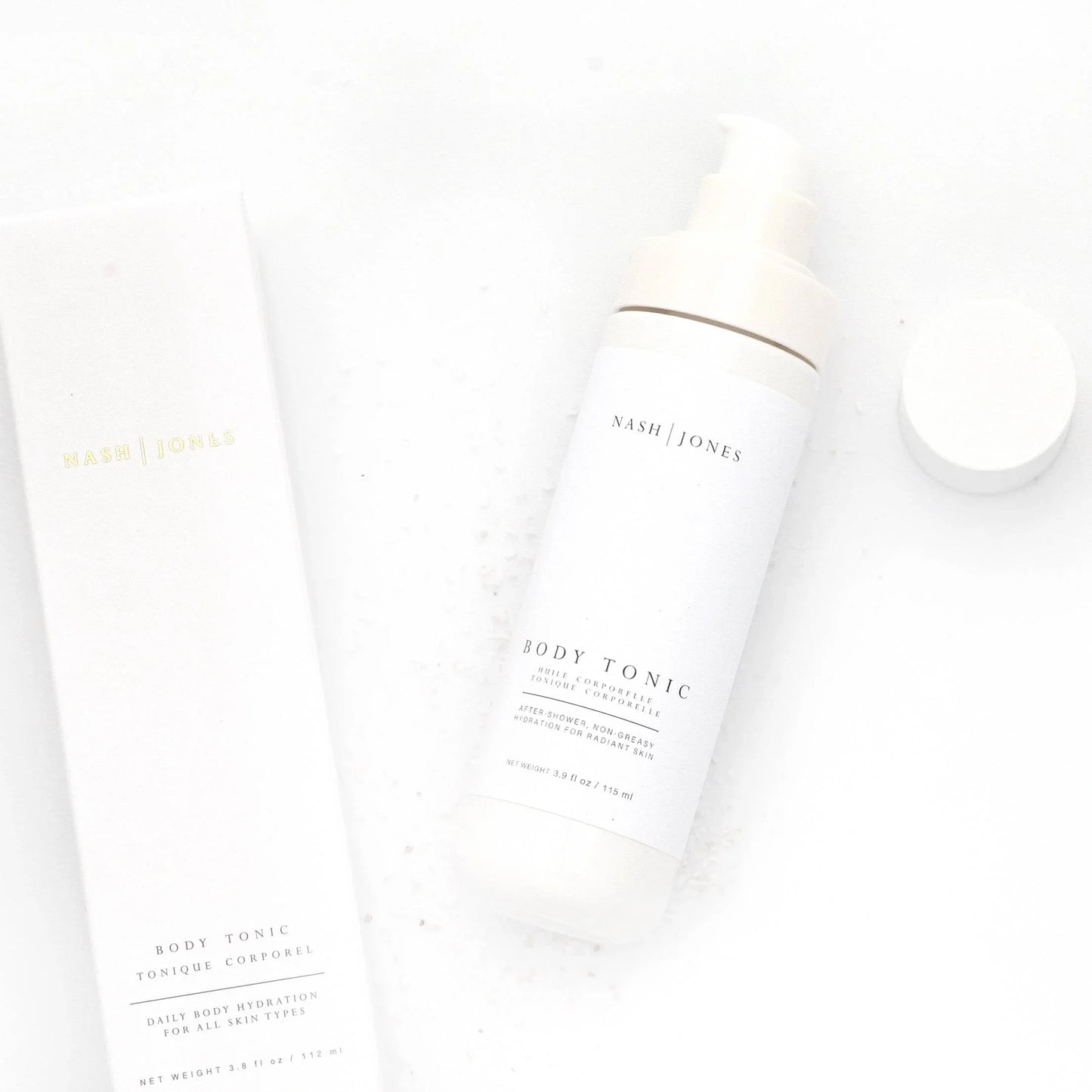 Nash | Jones Body Tonic skincare bottle and box on white background. Come see us at Awaken, Franklin, Tennessee