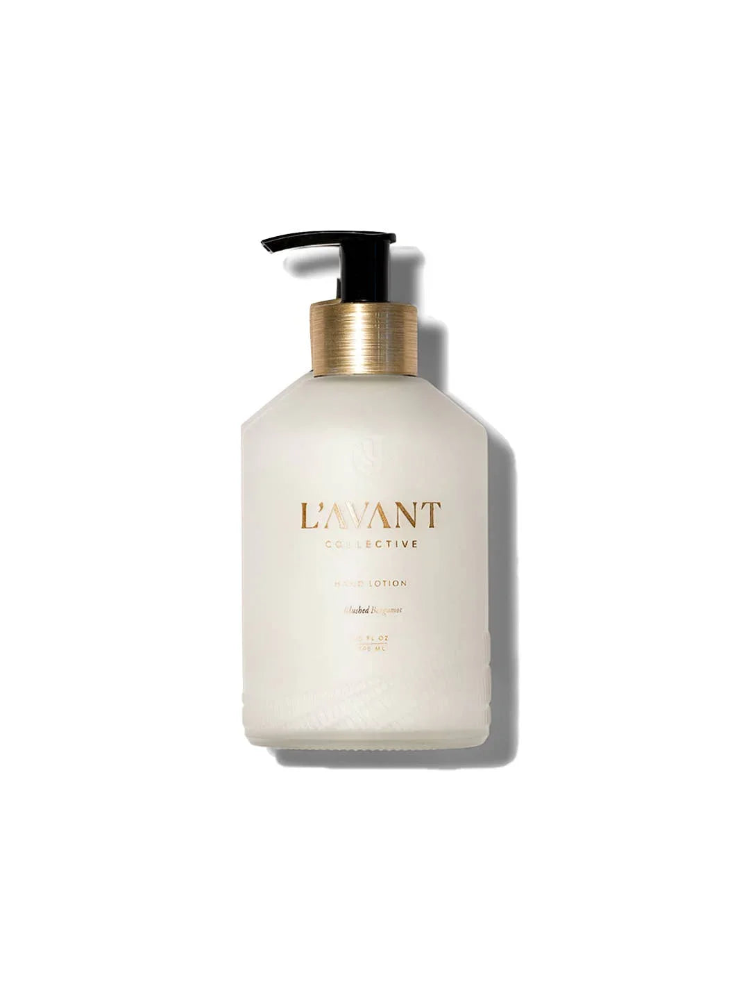 L'AVANT Collective hand lotion bottle with gold accents on white background, Come see us at Awaken, Franklin, Tennessee