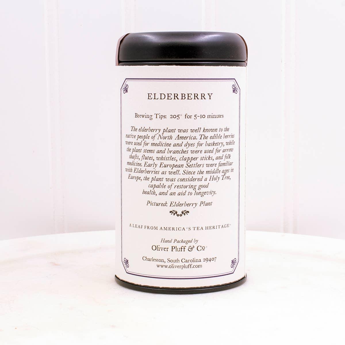 Elderberry tea tin by Oliver Pluff Co with brewing tips and history text, white background. Come see us at Awaken, Franklin, Tennessee