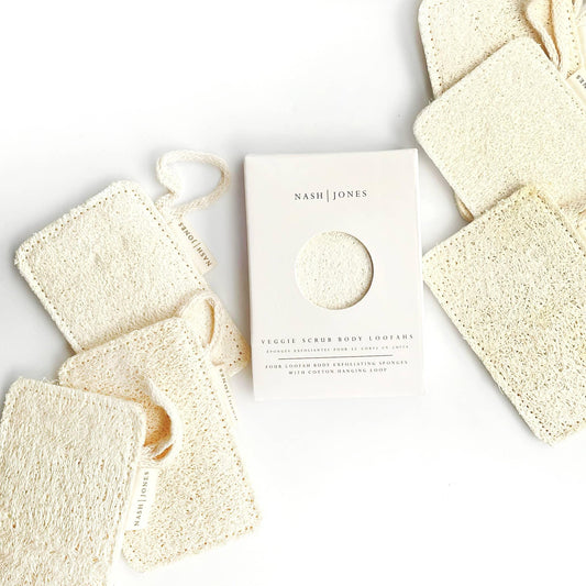 Nash Jones veggie scrub body loofahs with cotton hanging loop in white packaging and natural scrubbers. Come see us at Awaken, Franklin, Tennessee