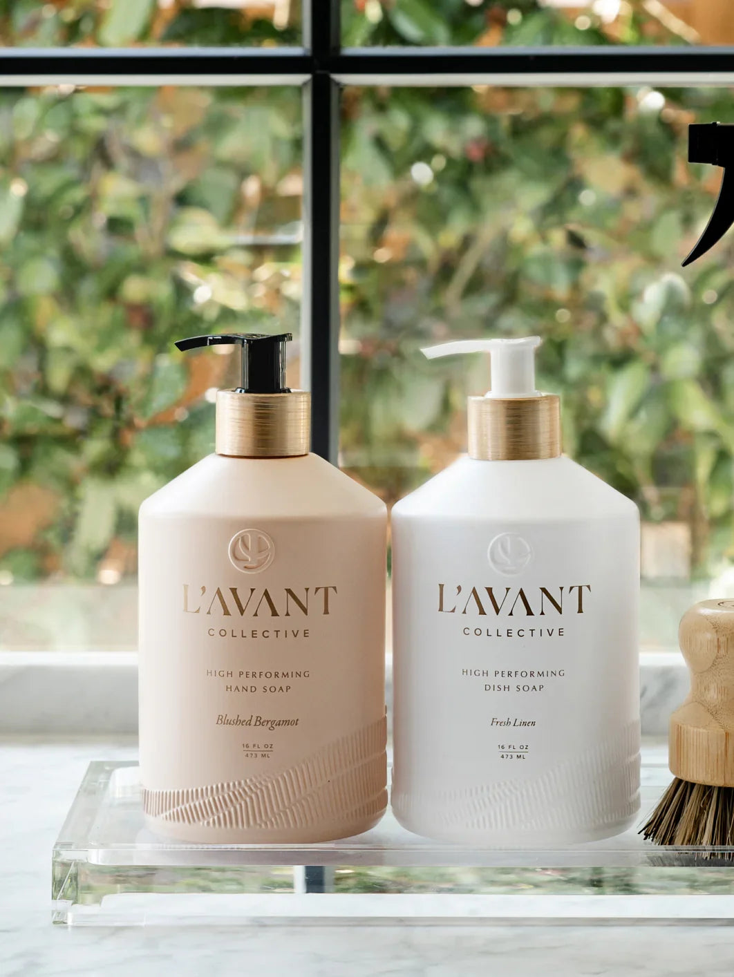 L'AVANT Collective hand soap and dish soap on marble, window background, Come see us at Awaken, Franklin, Tennessee