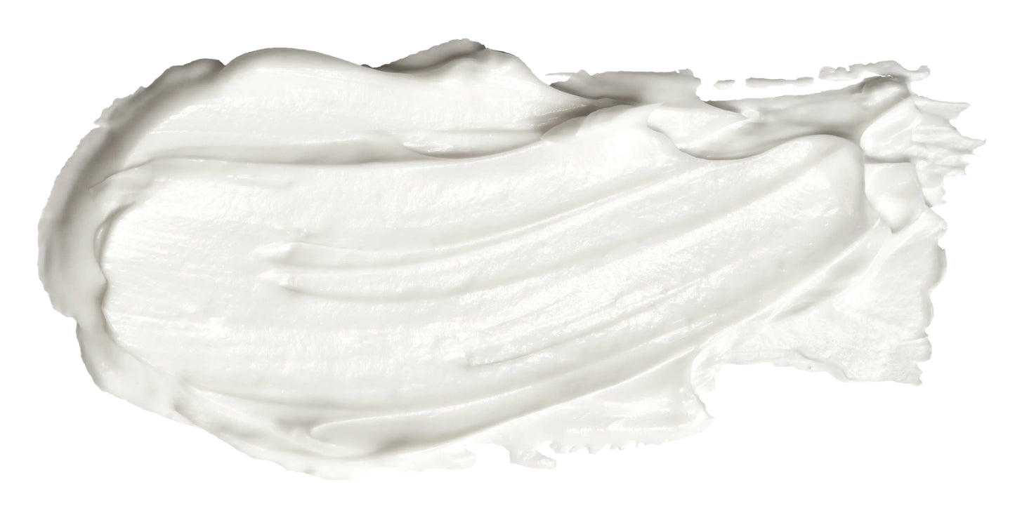 White creamy skincare or body lotion smear texture on white background. Come see us at Awaken, Franklin, Tennessee
