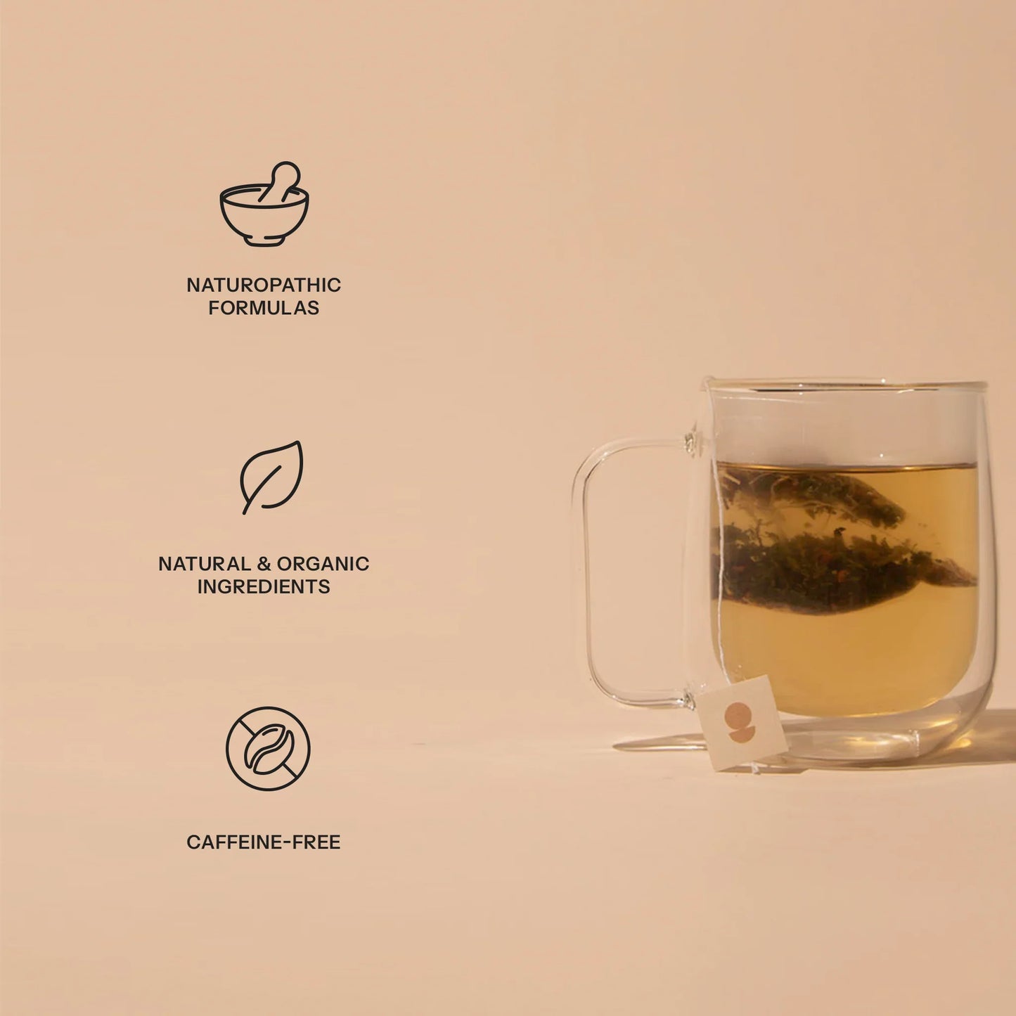 Glass cup of herbal tea with tea bag, highlighting naturopathic formulas, organic ingredients, caffeine-free, Come see us at Awaken, Franklin, Tennessee