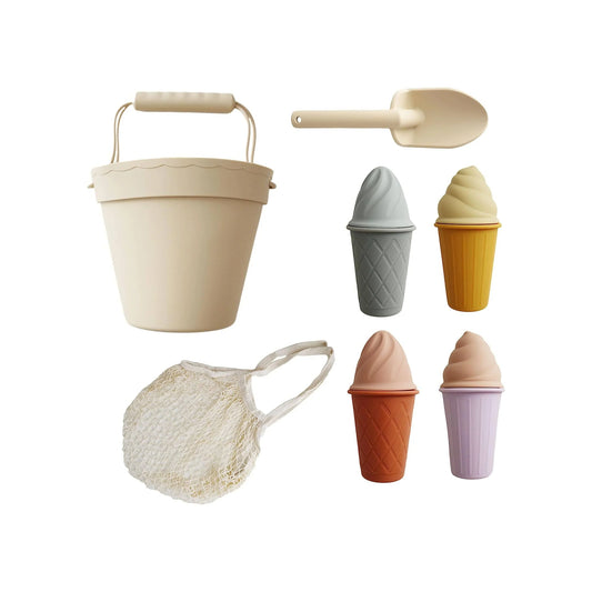 Children's beige sand bucket with scoop, mesh bag, and colorful ice cream cone toys, Come see us at Awaken, Franklin, Tennessee
