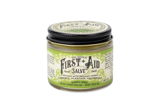 100% Natural First Aid Salve jar, organic herbal ointment with comfrey and calendula. Come see us at Awaken, Franklin, Tennessee