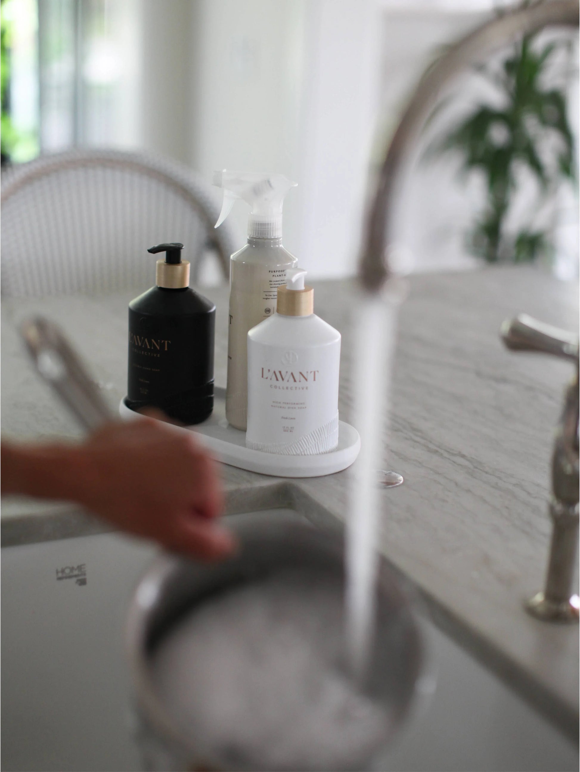 L’AVANT cleaning products on marble countertop in kitchen, Come see us at Awaken, Franklin, Tennessee.