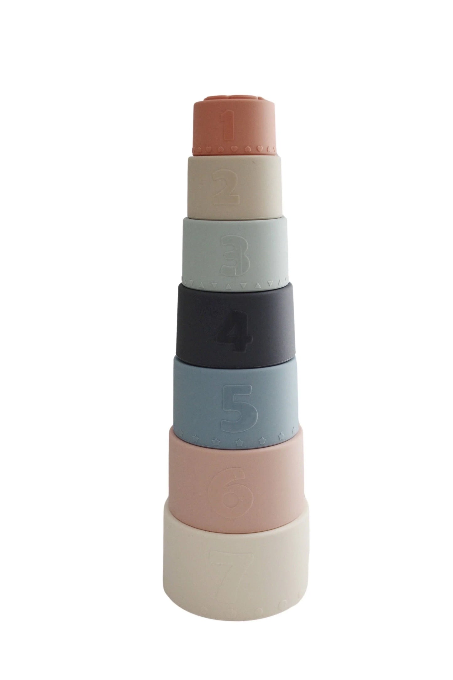 Stacked pastel-colored silicone numbered cups 1 to 7 on white background. Come see us at Awaken, Franklin, Tennessee
