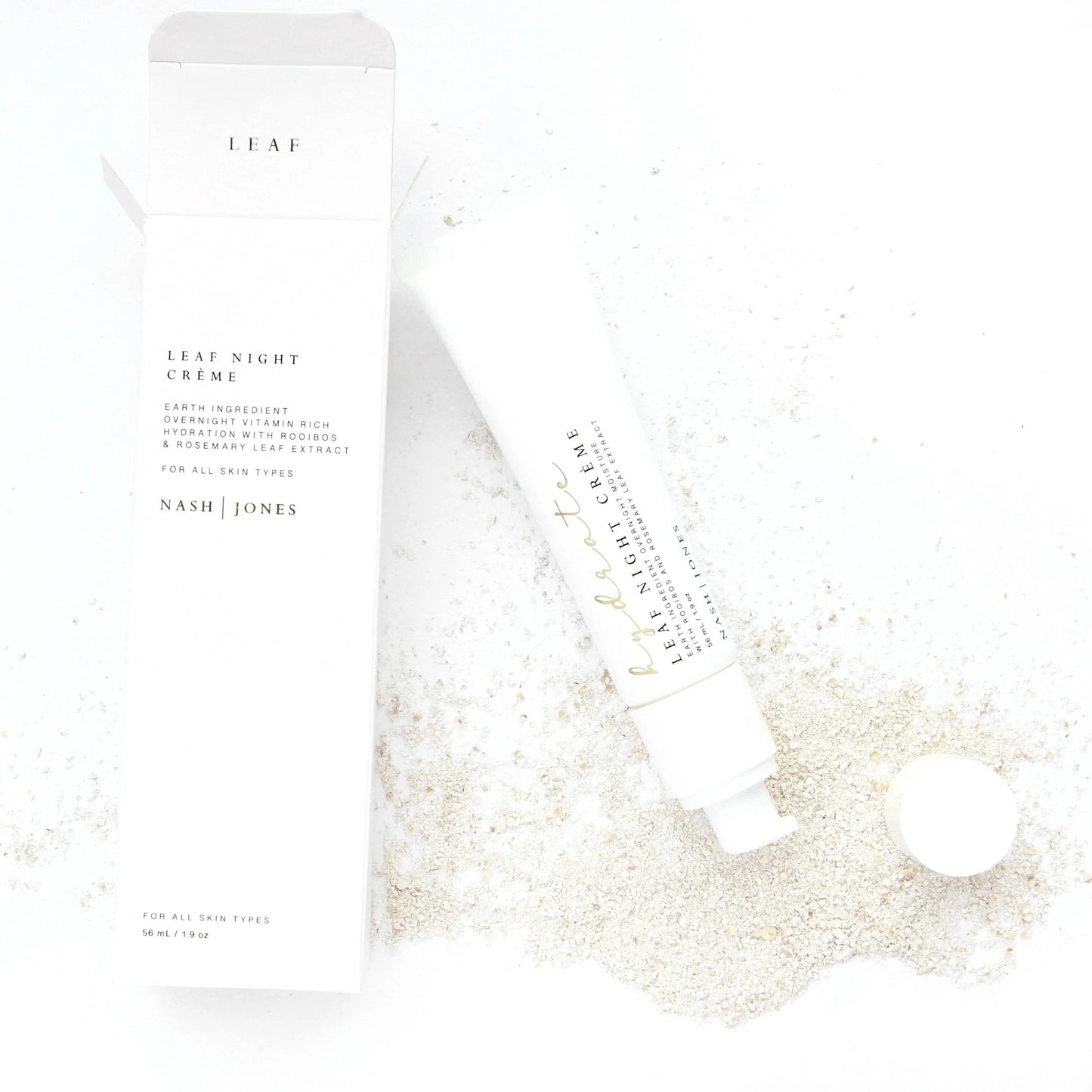 Leaf Night Crème tube and box with natural exfoliant on white background. Come see us at Awaken, Franklin, Tennessee
