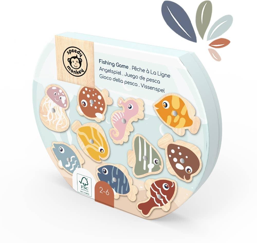 Speedy Monkey wooden fishing game with colorful sea animals, eco-friendly packaging. Come see us at Awaken, Franklin, Tennessee