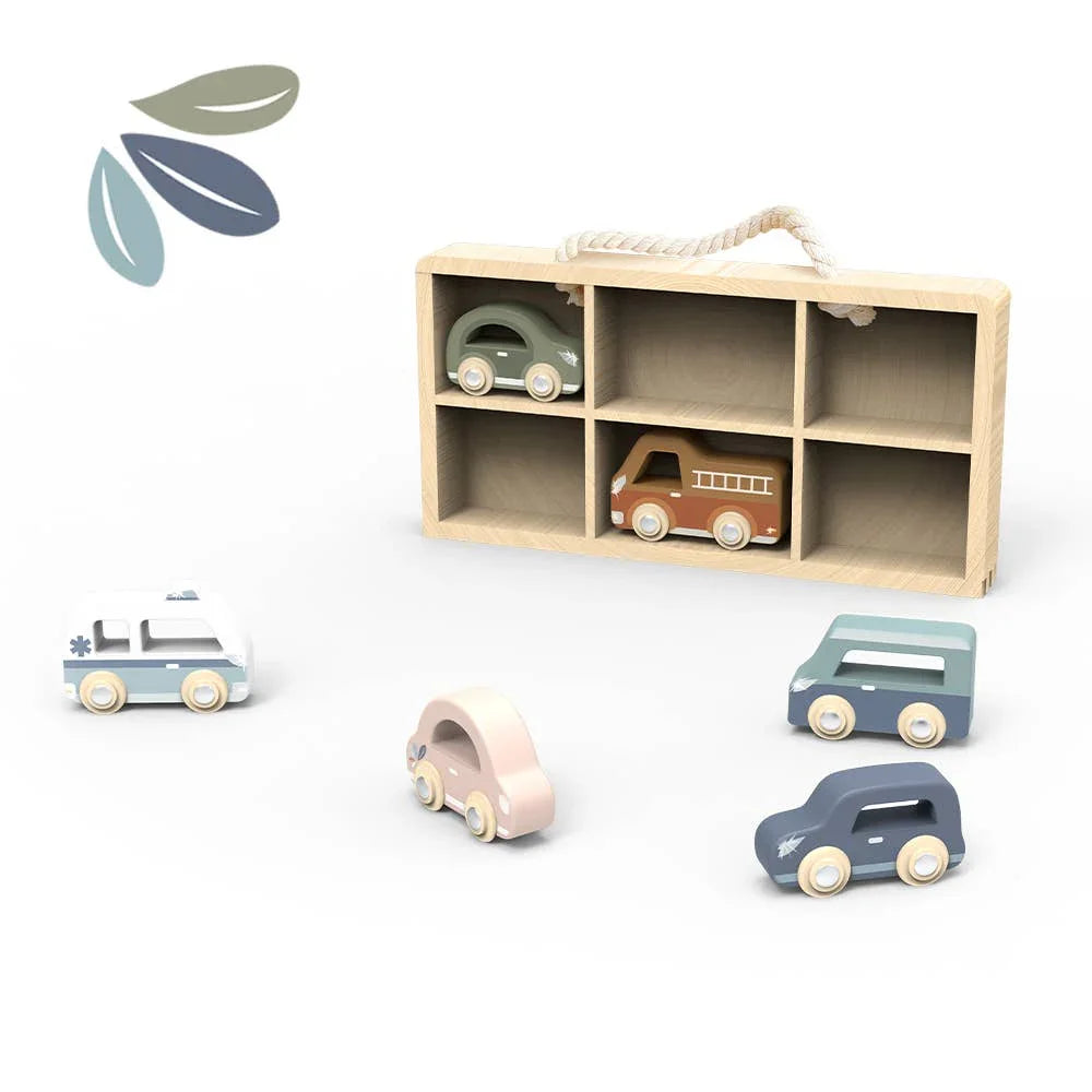 Wooden toy cars and storage box in pastel colors on white background. Come see us at Awaken, Franklin, Tennessee