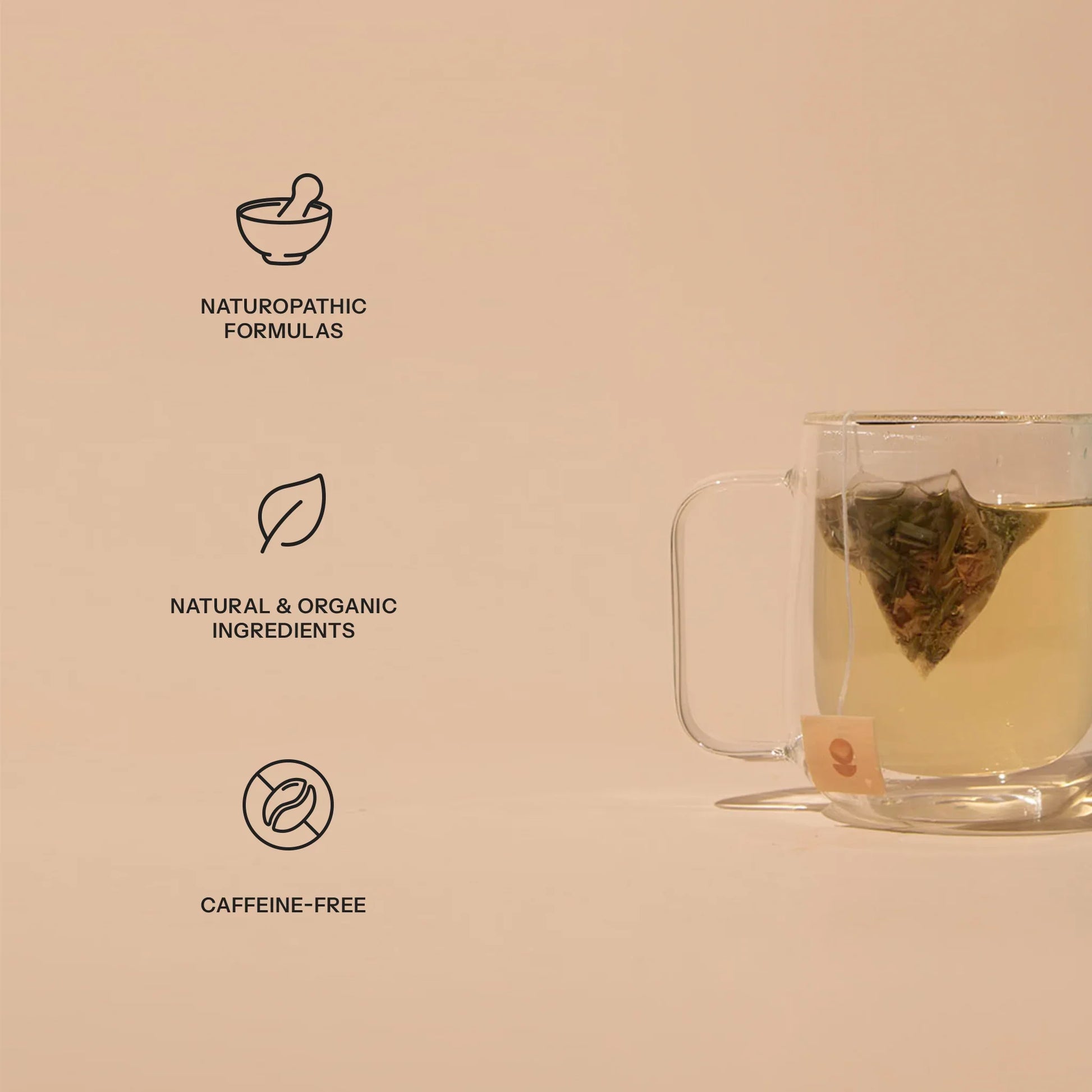 Glass cup of herbal tea with text icons for naturopathic formulas, natural organic ingredients, caffeine-free. Come see us at Awaken, Franklin, Tennessee