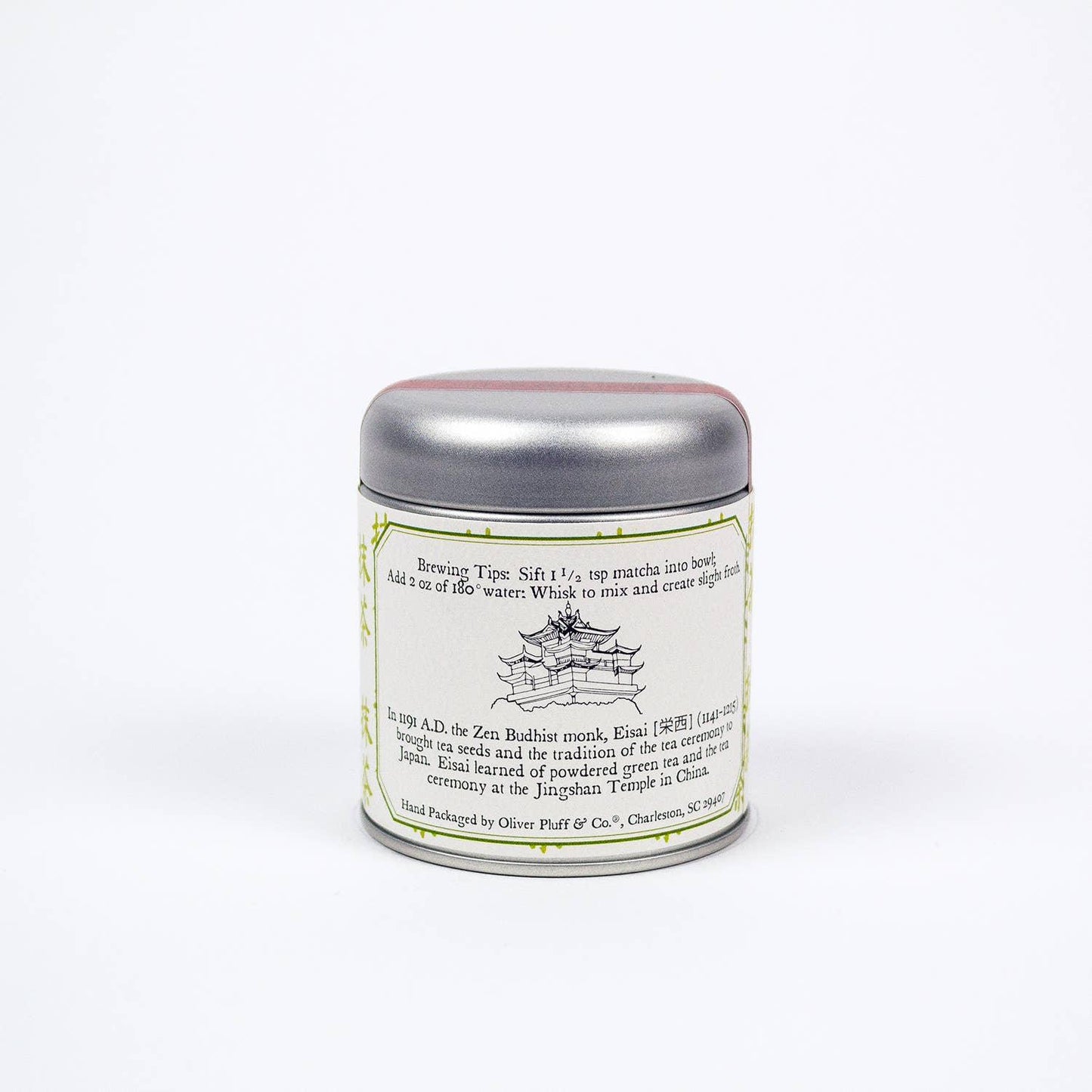 Metal tin of matcha green tea with brewing tips and historical text on white background. Come see us at Awaken, Franklin, Tennessee