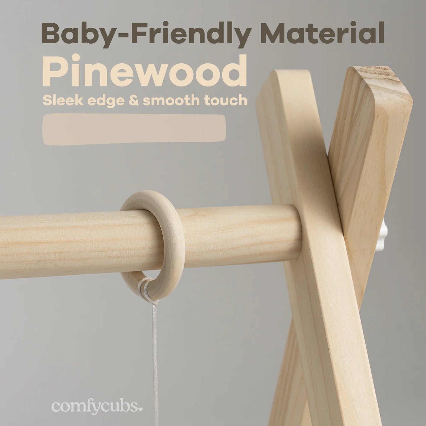 Close-up of baby-friendly pinewood play gym with sleek edges and smooth touch, natural wood finish. Come see us at Awaken, Franklin, Tennessee