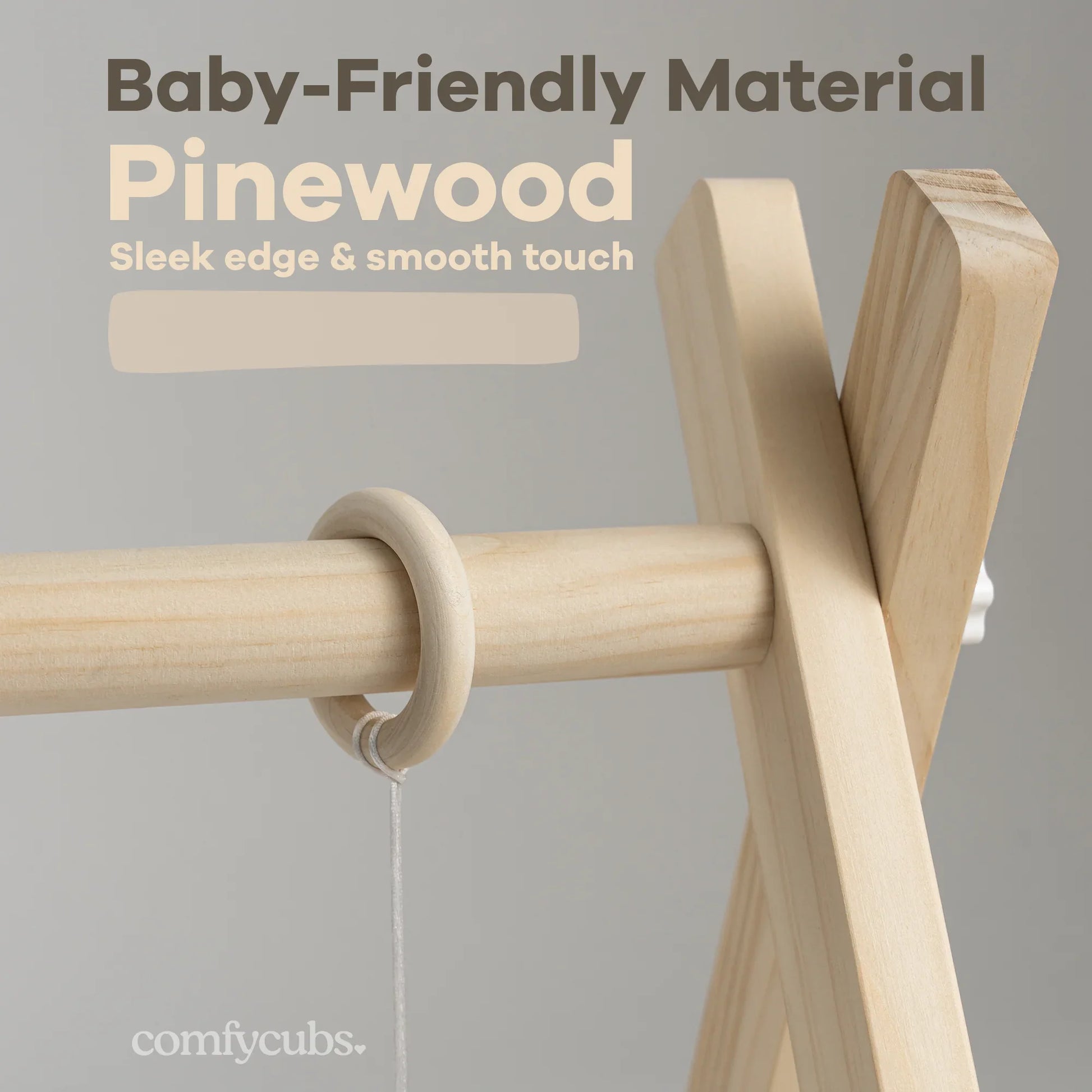 Close-up of baby-friendly pinewood play gym with sleek edges and smooth touch, natural wood finish. Come see us at Awaken, Franklin, Tennessee