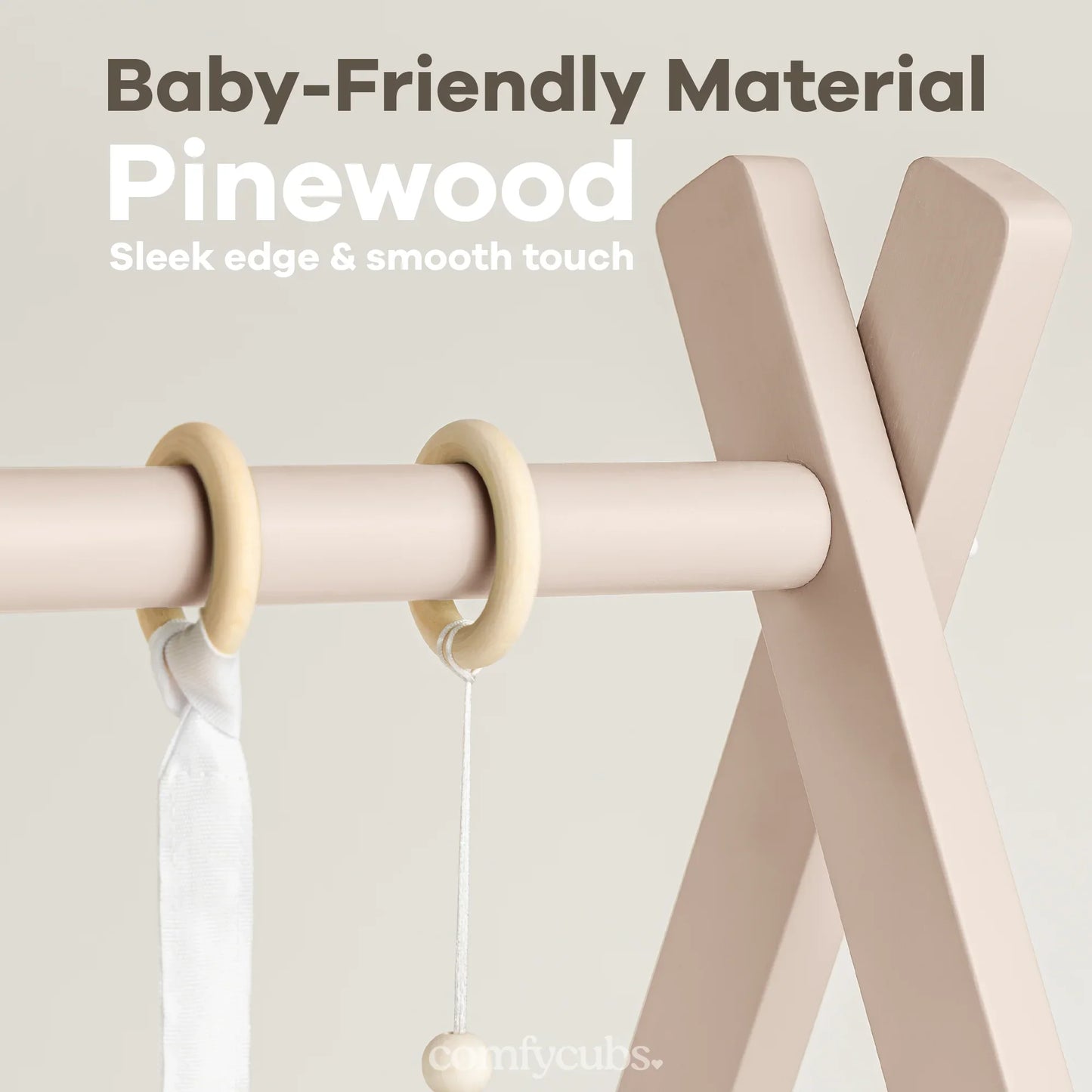 Baby-friendly pinewood play gym with smooth edges and wooden rings, cream color design. Come see us at Awaken, Franklin, Tennessee