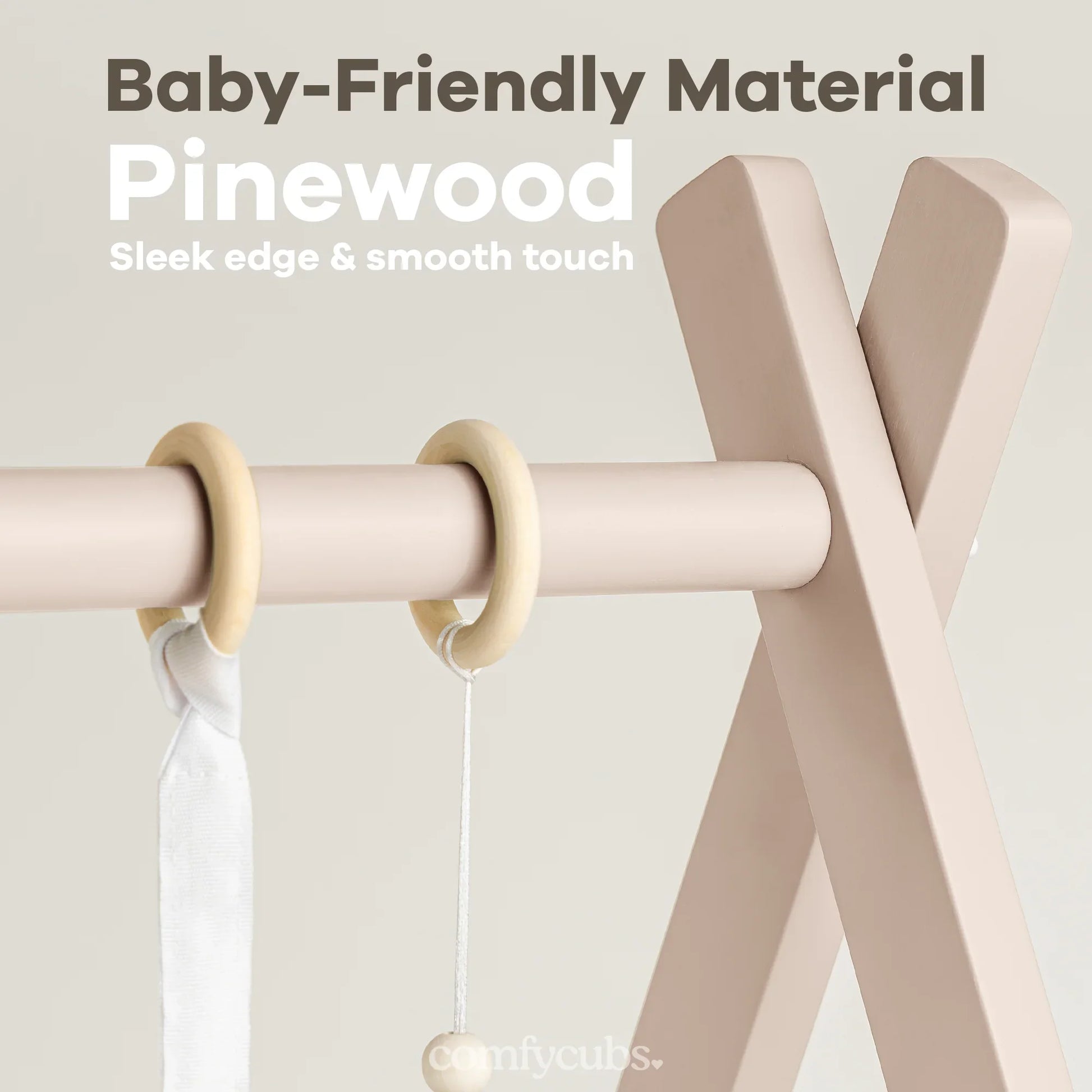 Baby-friendly pinewood play gym with smooth edges and wooden rings, cream color design. Come see us at Awaken, Franklin, Tennessee