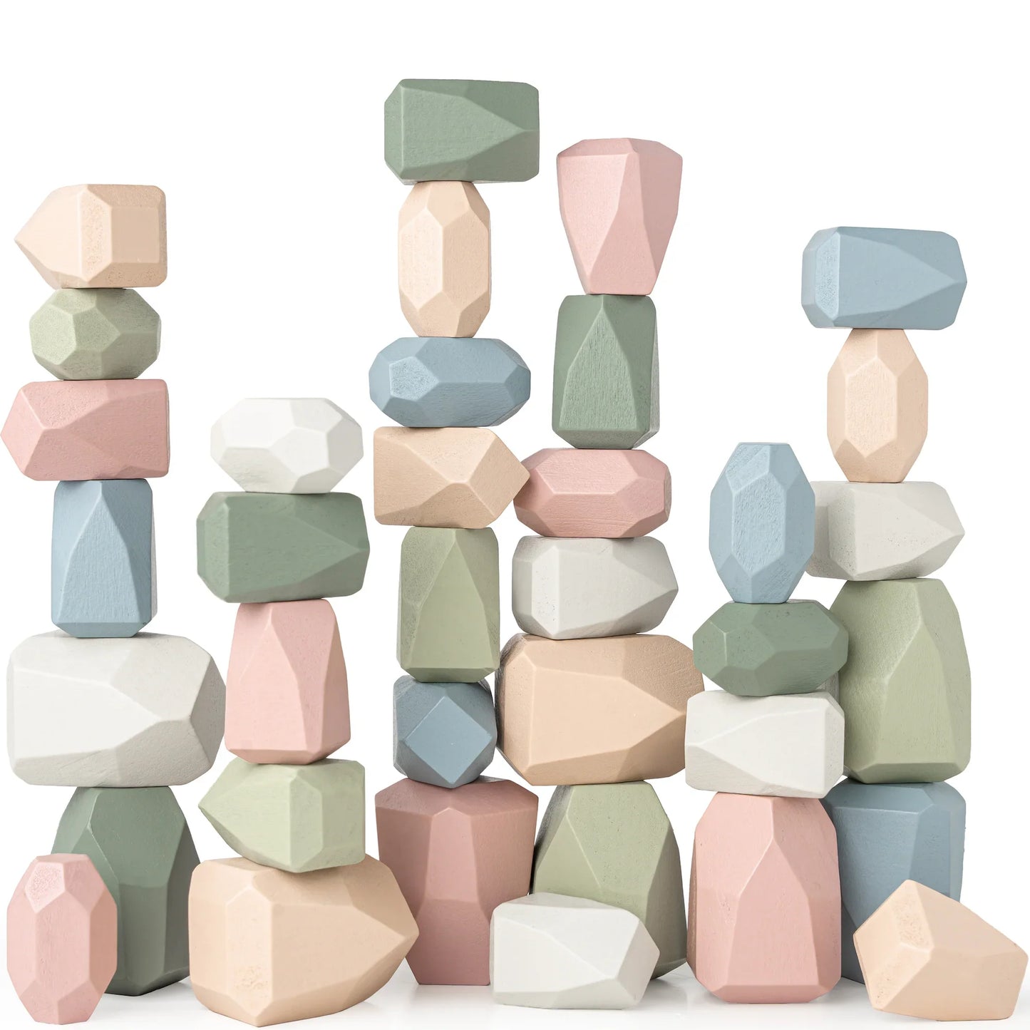 Stacked pastel wooden balancing stones in pink, blue, green, and white colors, geometric shapes. Come see us at Awaken, Franklin, Tennessee