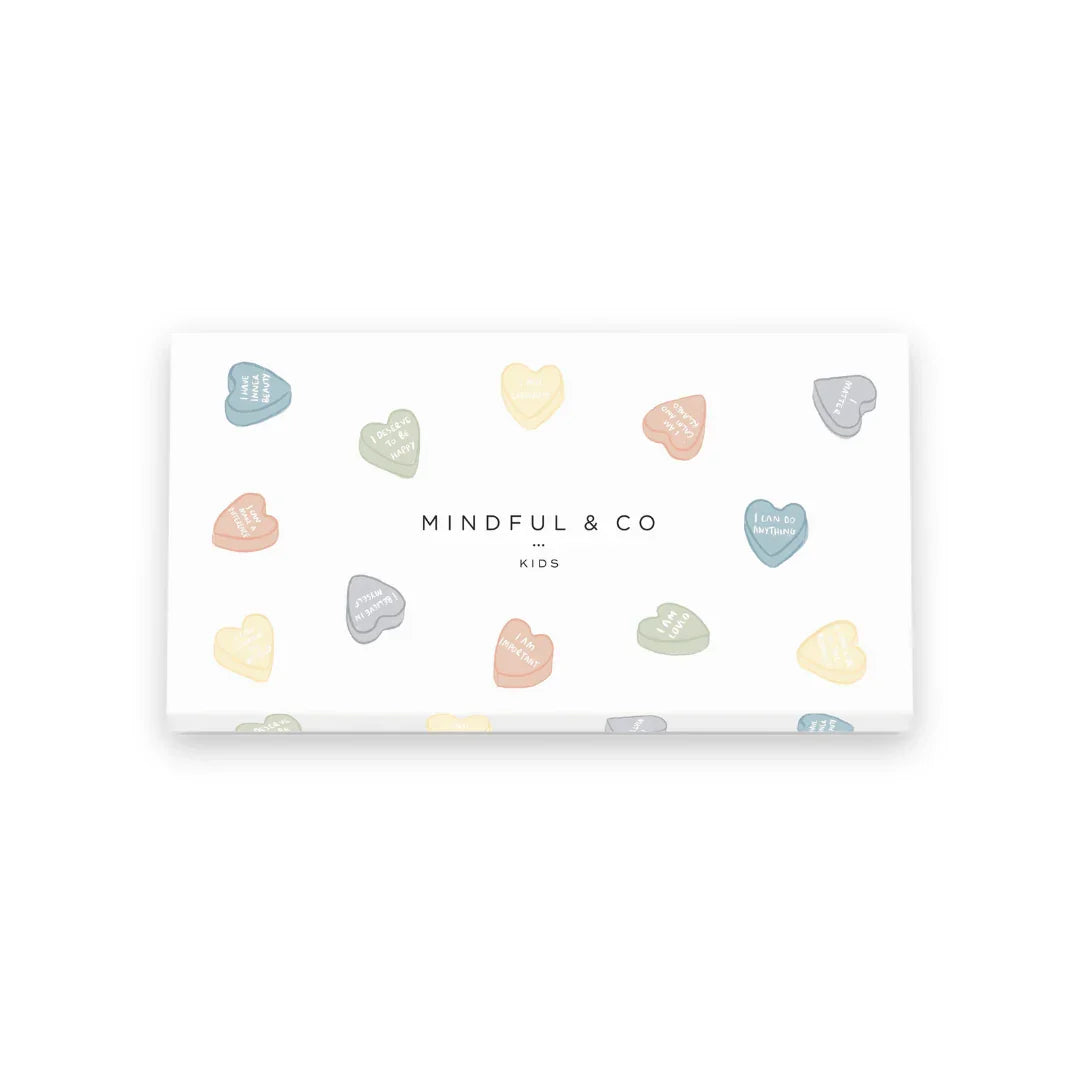 Mindful & Co Kids box with colorful heart shapes and positive messages on white background. Come see us at Awaken, Franklin, Tennessee