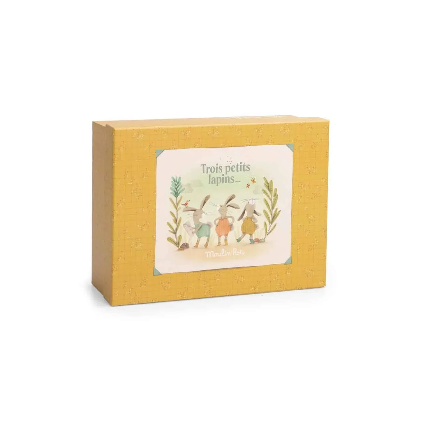 Yellow box with illustration of three rabbits and text Trois petits lapins, Moulin Roty. Come see us at Awaken, Franklin, Tennessee