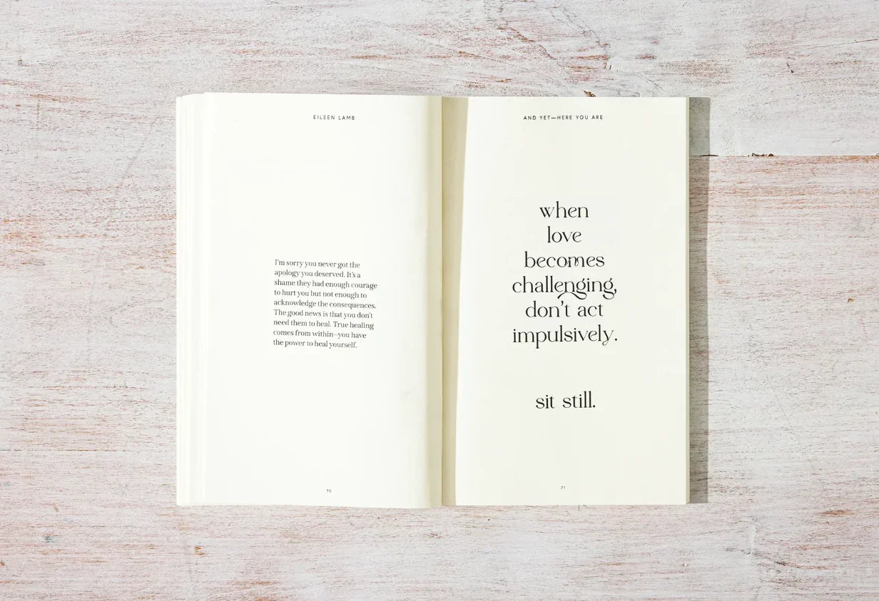 Open book with healing and love quotes on wooden table, motivational reading material. Come see us at Awaken, Franklin, Tennessee